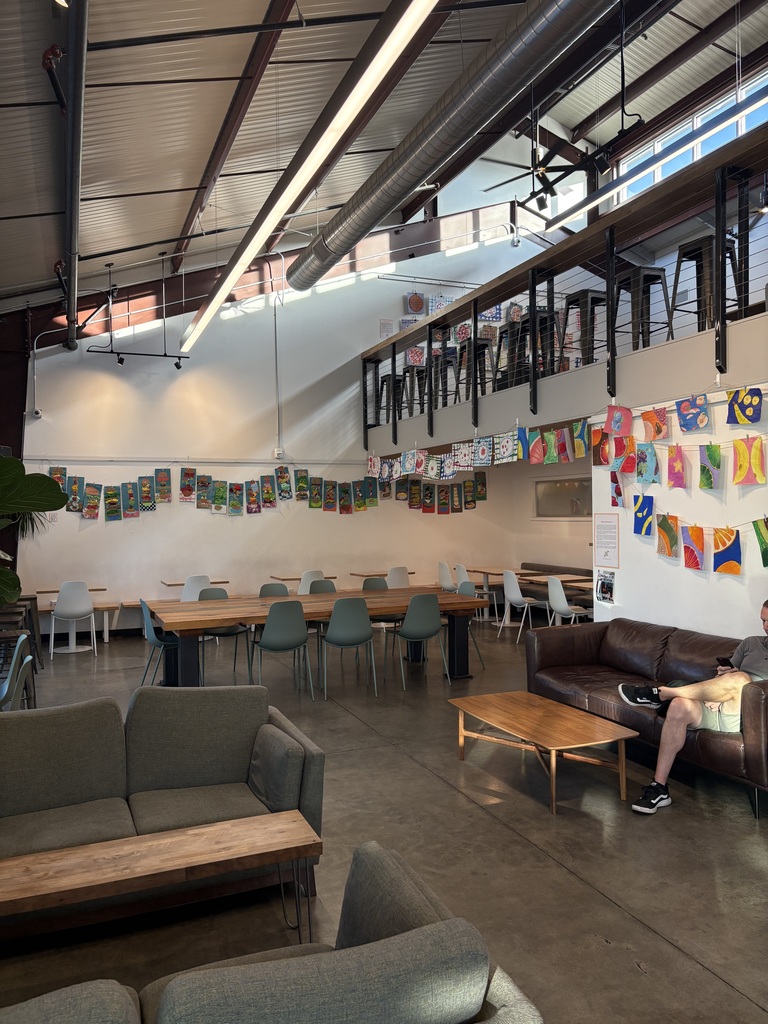 A view of our students' artwork decorating the cafe walls!