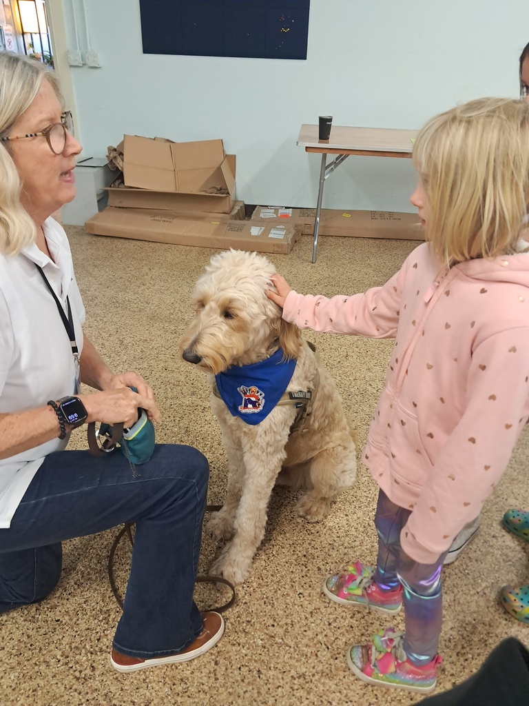 Here is Winston greeting one of our students!