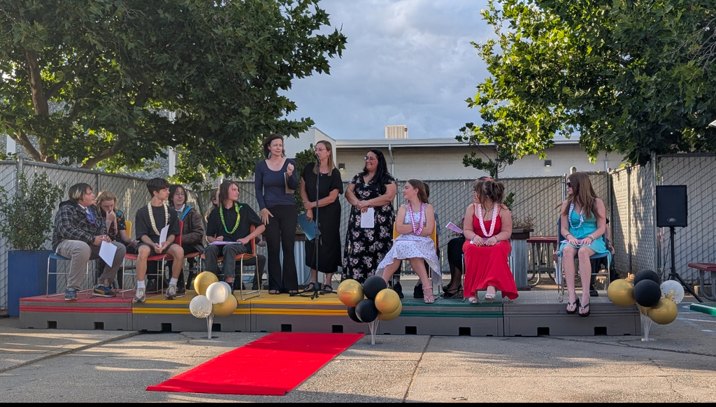 Our WOCAP teachers Cassandra, Melissa, and Jessie congratulating our 8th graders on graduating!