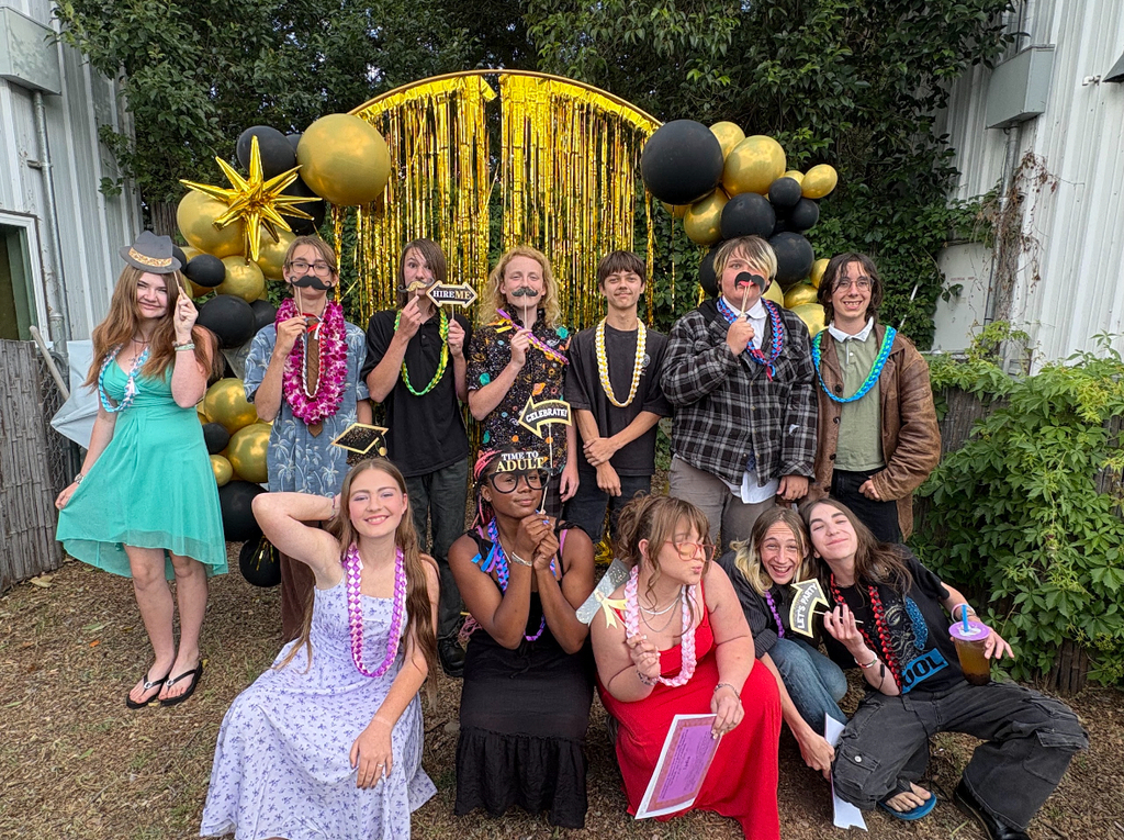 Our graduating 8th graders posing for a photo shoot!