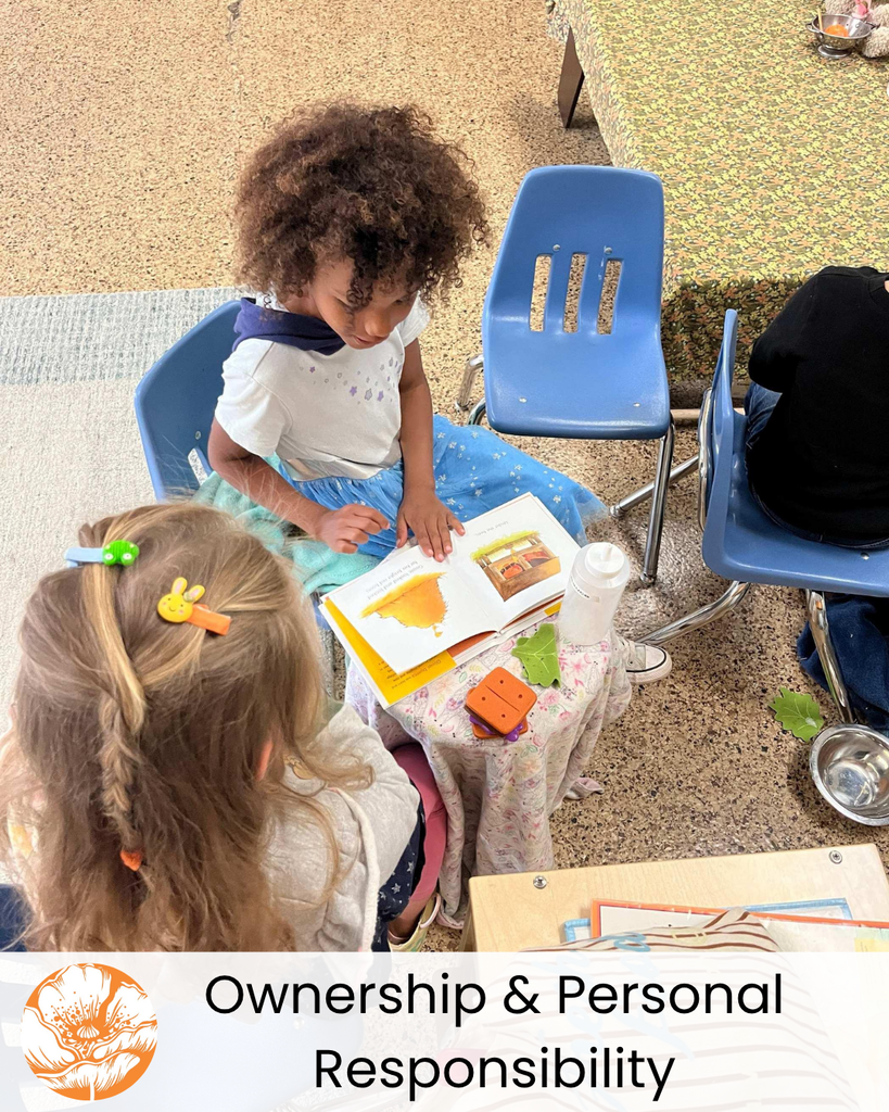 The Ownership and Personal Responsibility pillar with two of our students reading to each other.