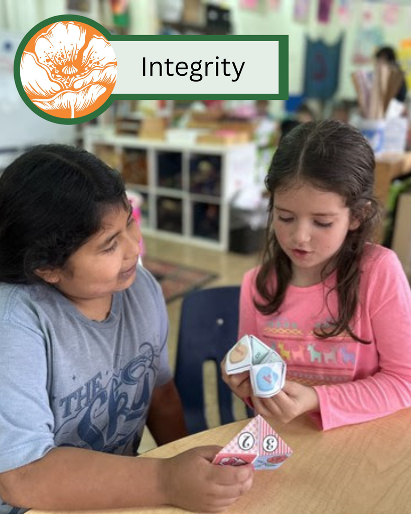 A photo of two girls playing with cootie catchers with text that says "Integrity."