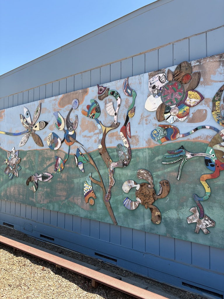 Here is the other side of our all-school mural with flowers and insects.