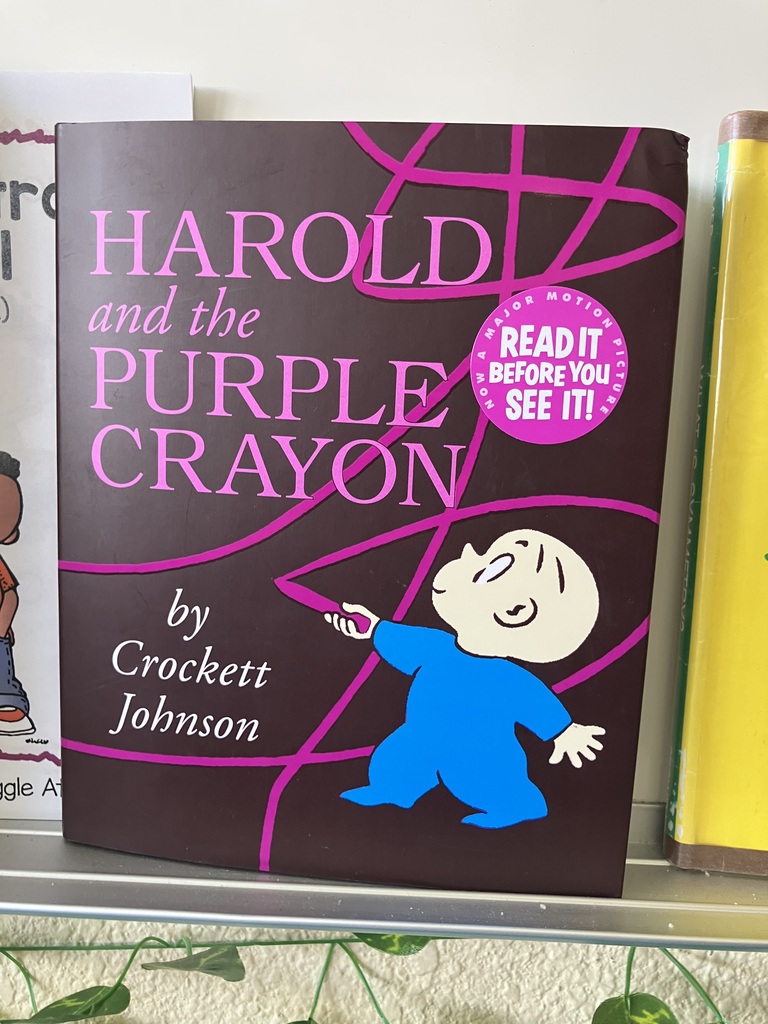 Here is a photo of a book titled "Harold and the Purple Crayon." On the cover is a picture of a young boy holding a purple crayon, which has one long, purple line being drawn al over from it. Harold is wearing all blue and he does not have any hair. The background cover of the book is brown. Harold is in the bottom right corner and the title (also purple) is in the top left corner.