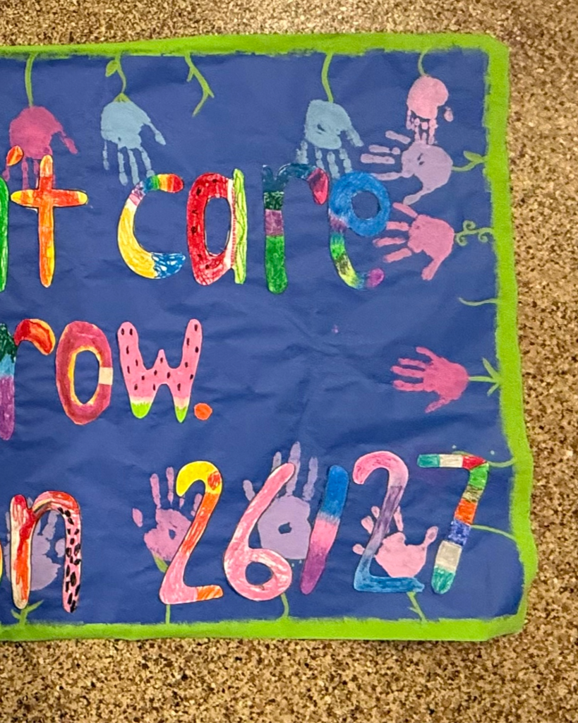 Here is the last photo of the Dolly Parton banner our students created. The banner is long and horizontal, which is why is has been split between three frames.