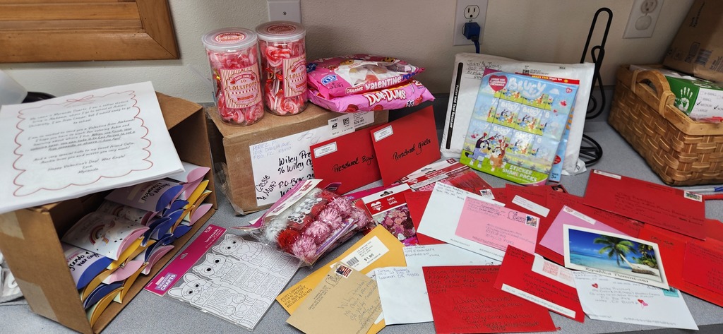 Picture showing valentine mail and goodies sent to the Wiley Preschool classes.