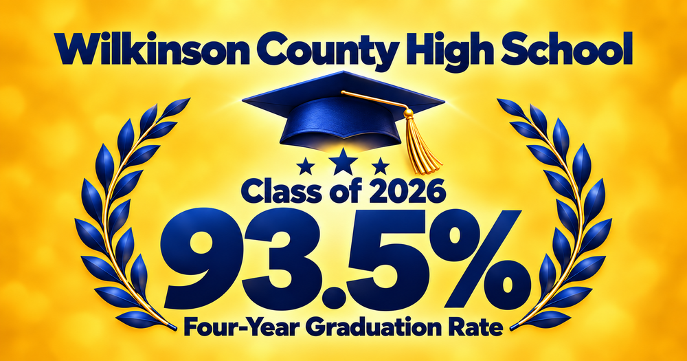 Gold-and-blue graphic announcing Wilkinson County High School’s 93.5% four-year graduation rate for the Class of 2026. A blue graduation cap with a gold tassel sits above the rate, framed by blue laurel branches and stars.