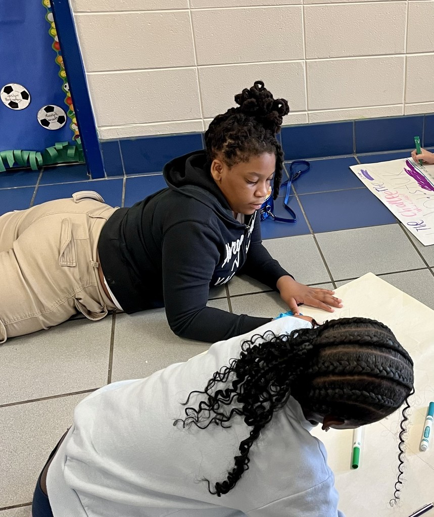 girls working together to create a project