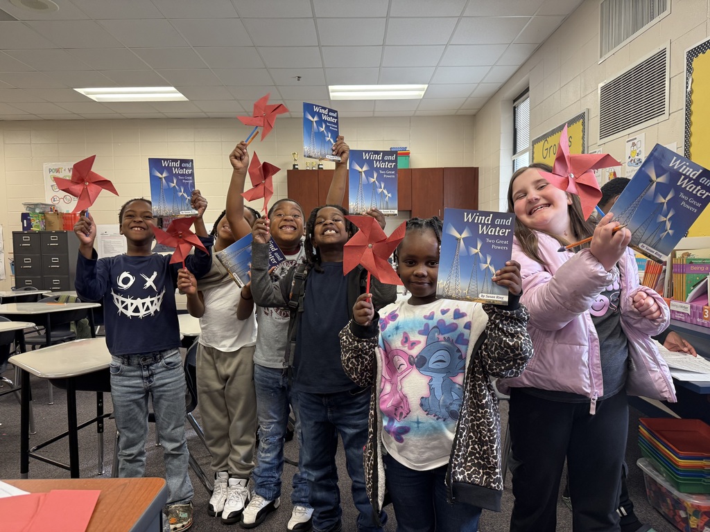 Elementary students in an afterschool program design and test handmade windmills, exploring how wind energy works through a hands-on STEM activity.