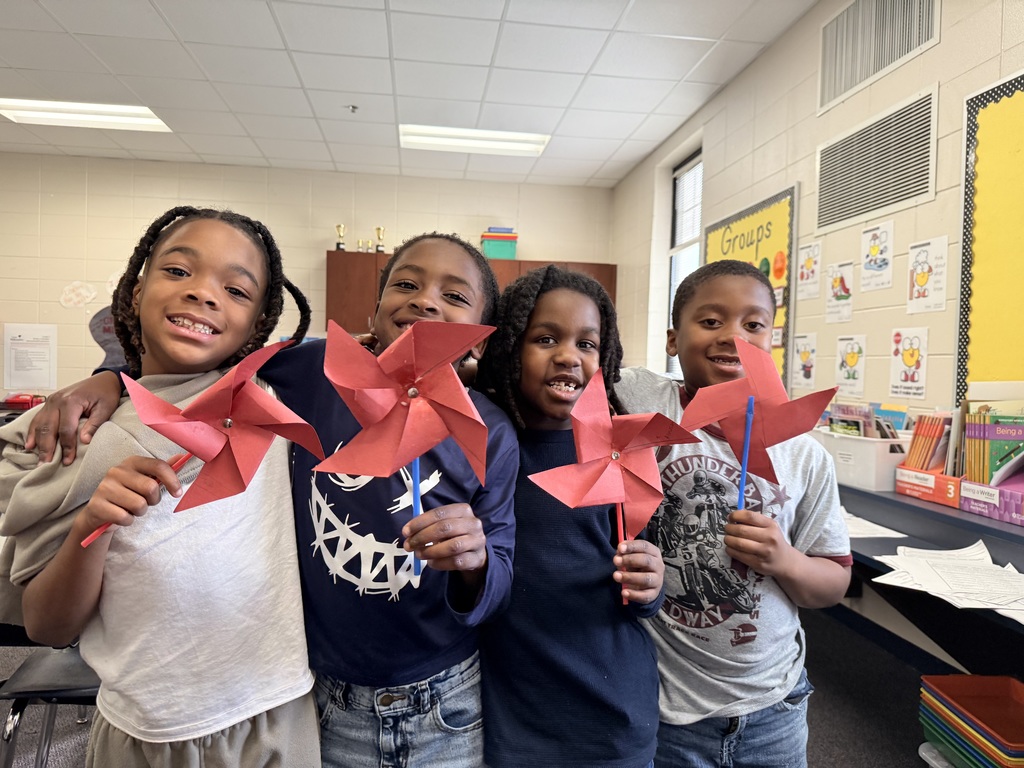 Elementary students in an afterschool program design and test handmade windmills, exploring how wind energy works through a hands-on STEM activity.