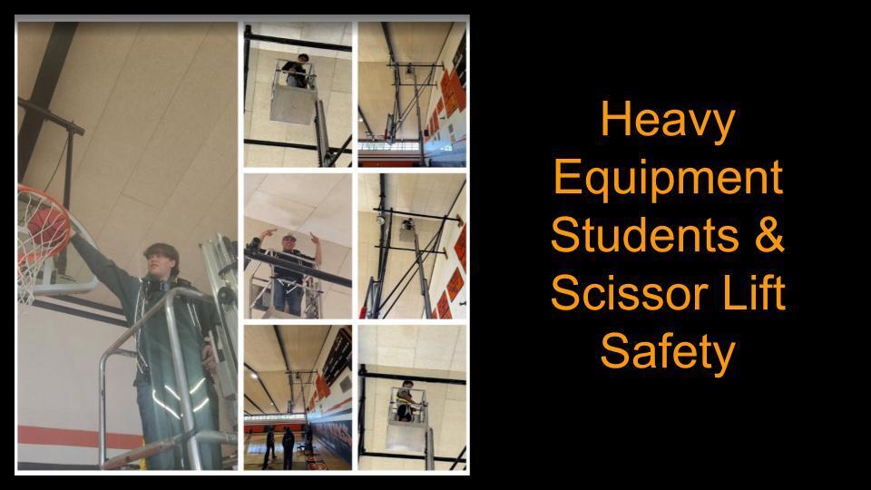 HEO Students on the scissor lift