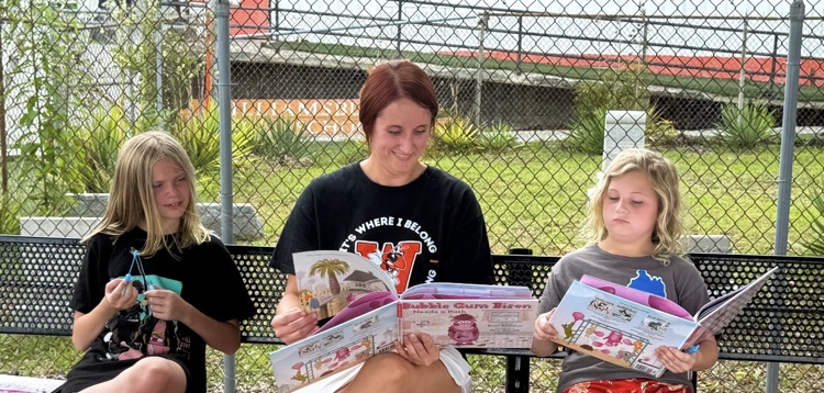 Pictures from books and bubbles with the principal.