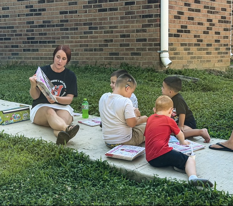 Pictures from books and bubbles with the principal.