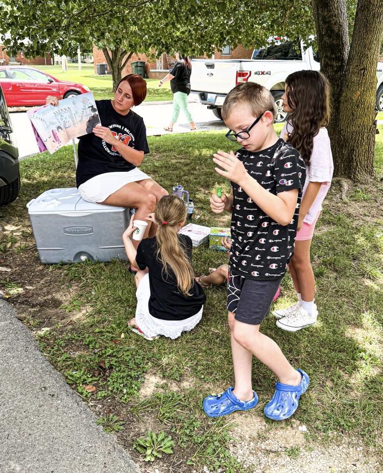 Pictures from books and bubbles with the principal.