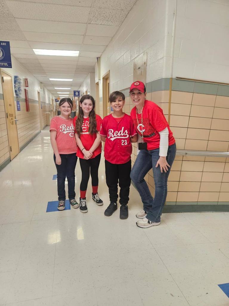kids wearing Cincinnati Reds shirts