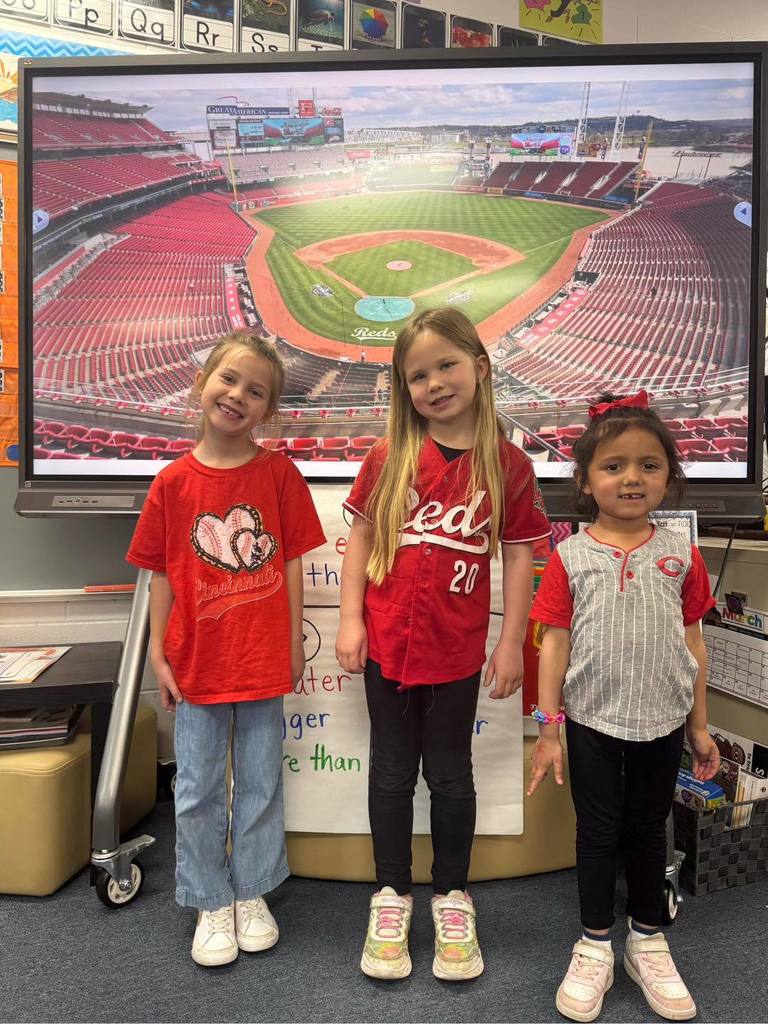kids wearing Cincinnati Reds shirts