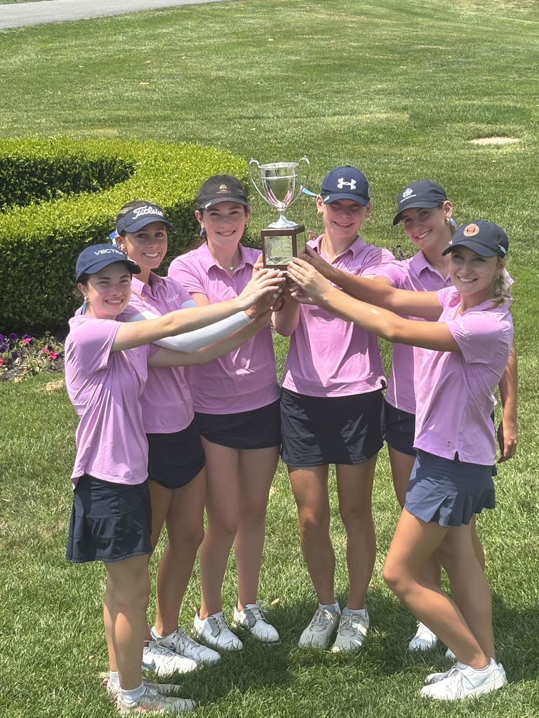 Kya Quimby with team and with trophy
