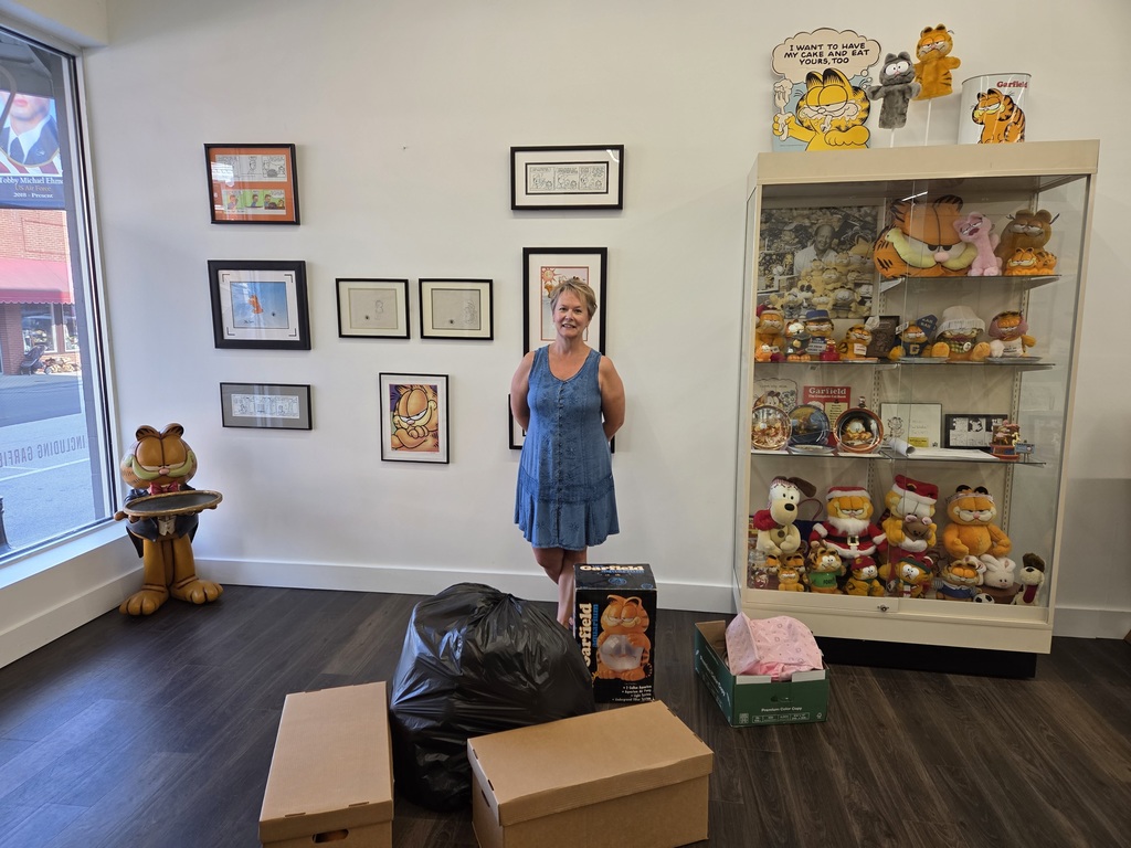 Dr stoudt with her collection of garfield items