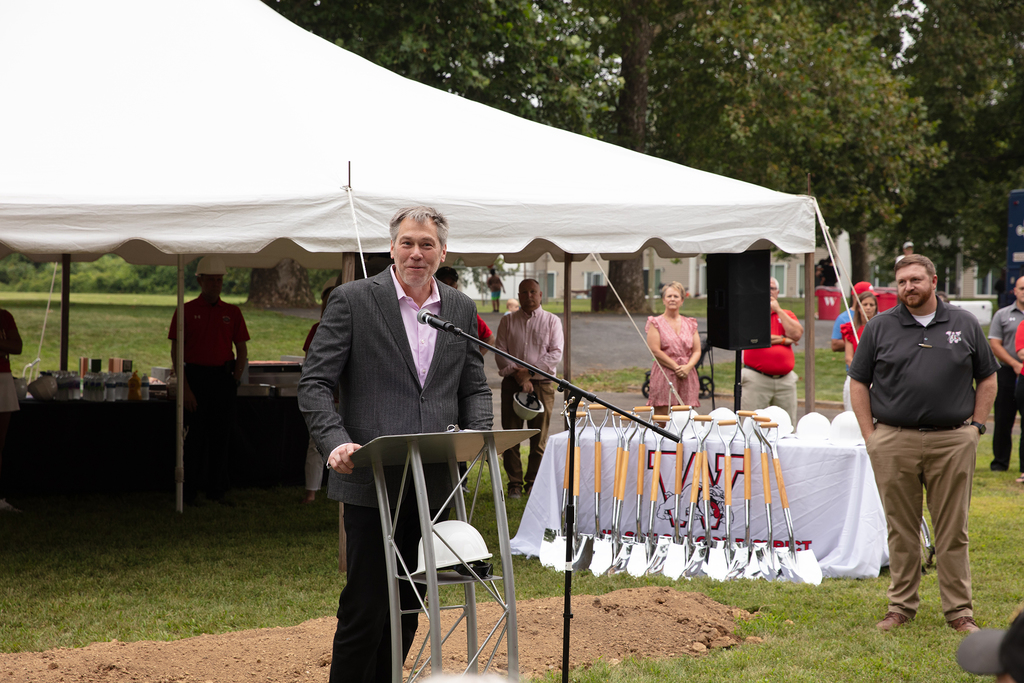 ed case speaking at podium