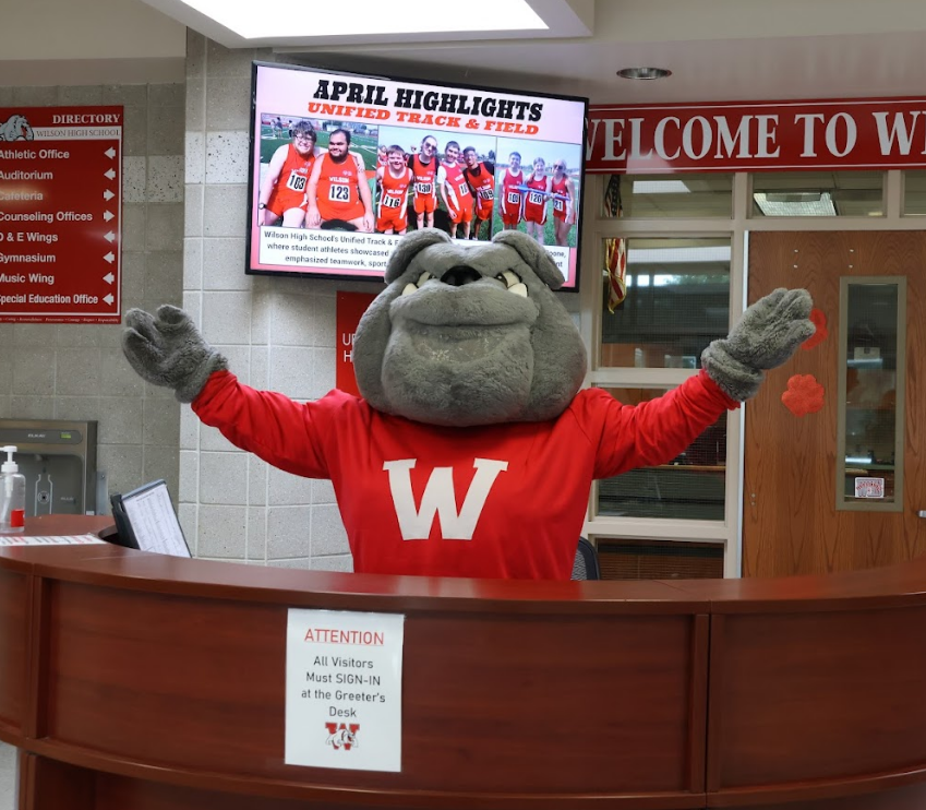 Bulldog mascot at high school greeter desk