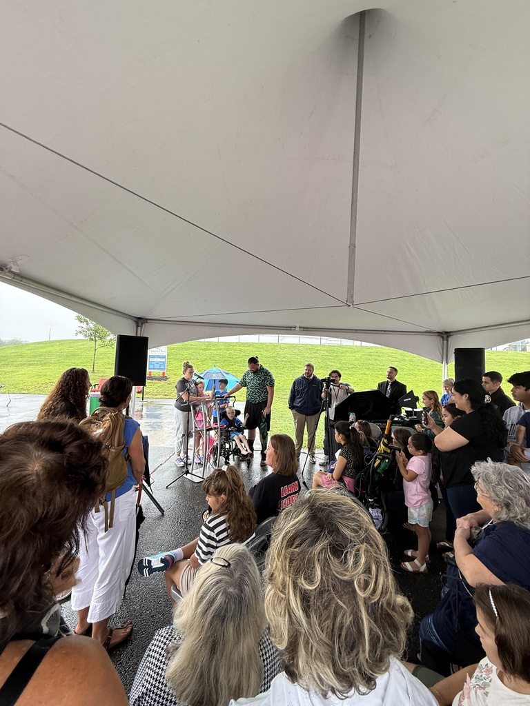 Family speaking at event
