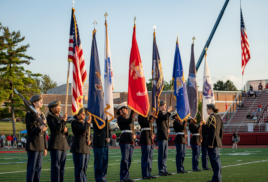 JROTC holding flags
