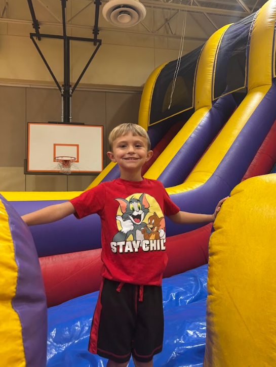 student getting off slide