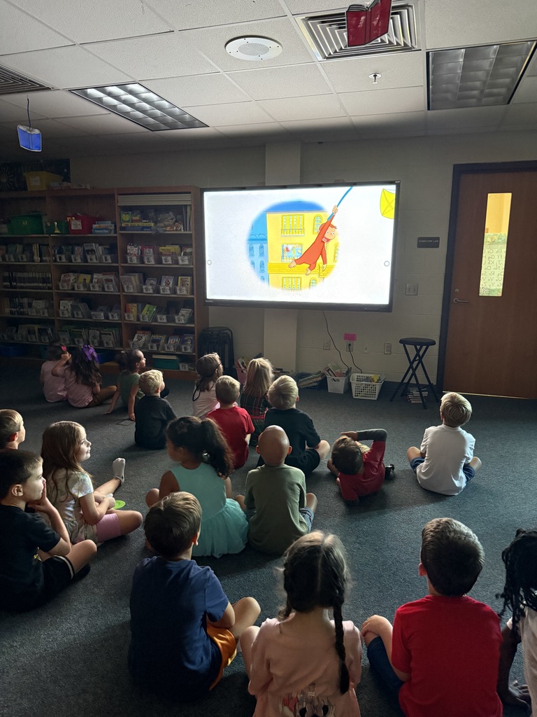 students watching curious george