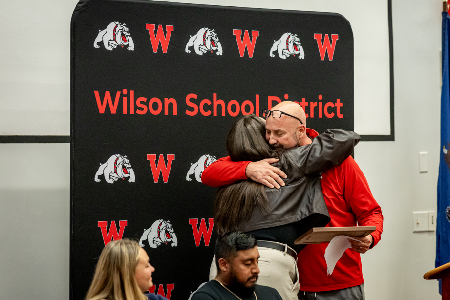 woman hugging coach