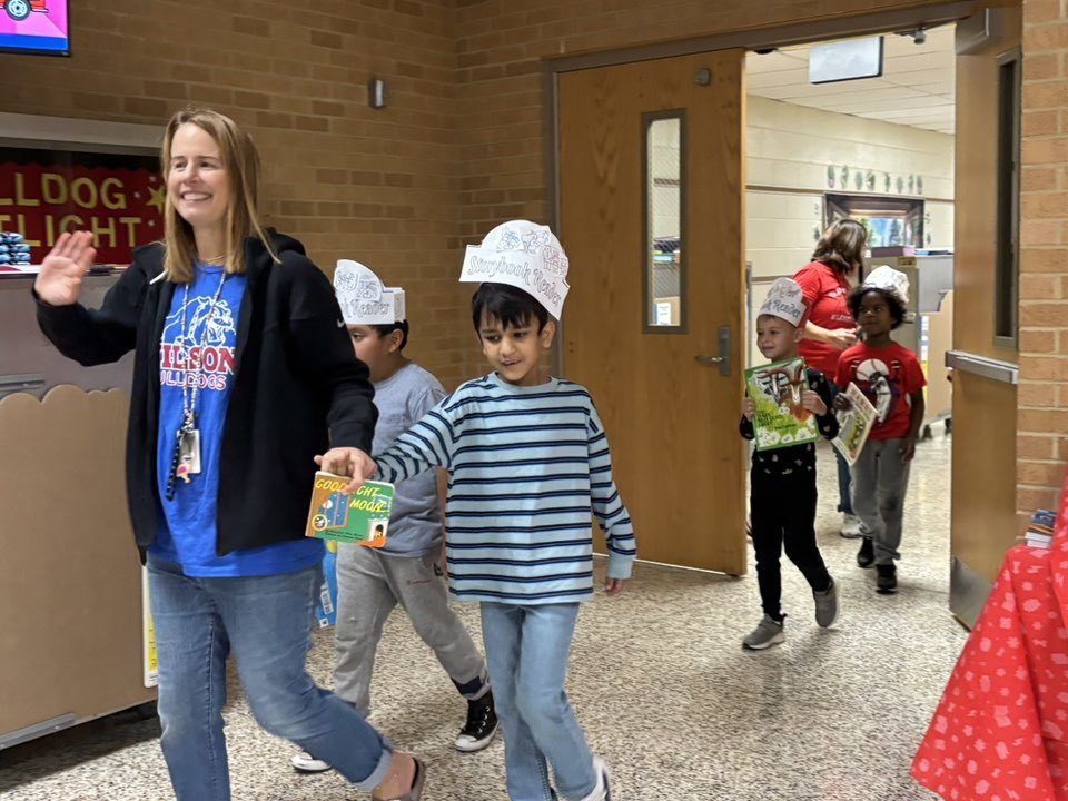 student walking with teacher