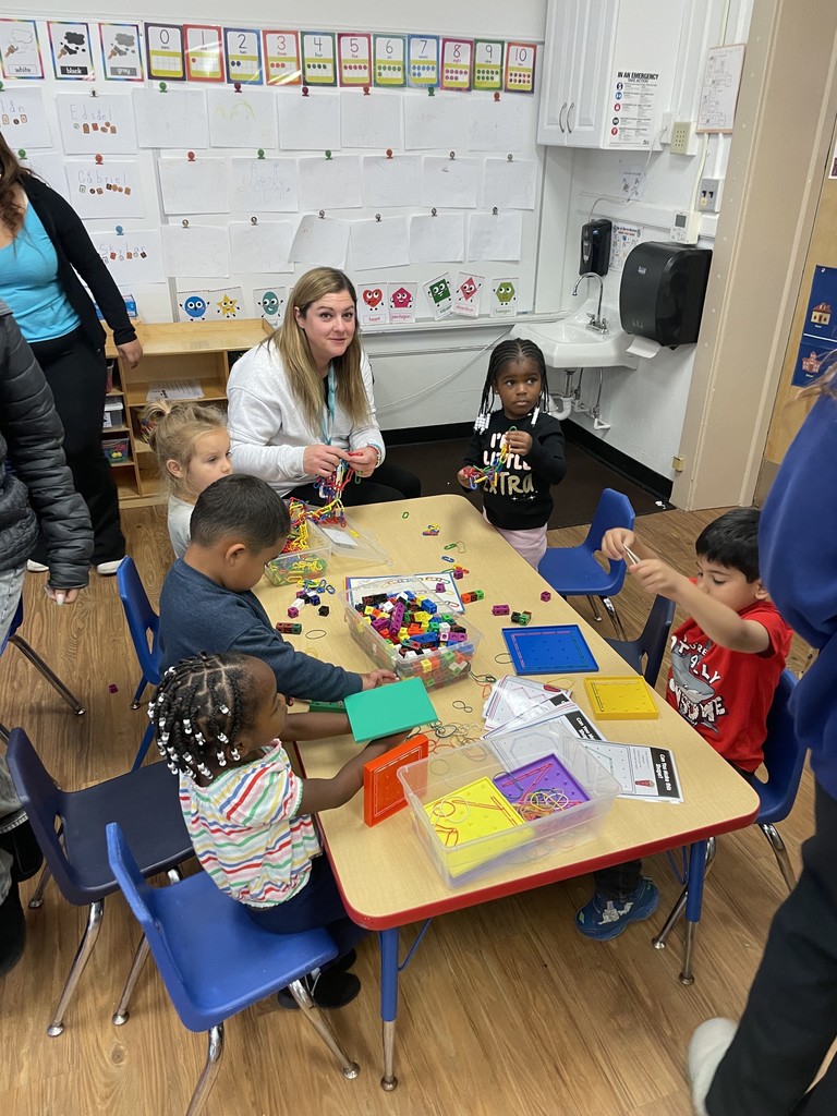 students at table playing