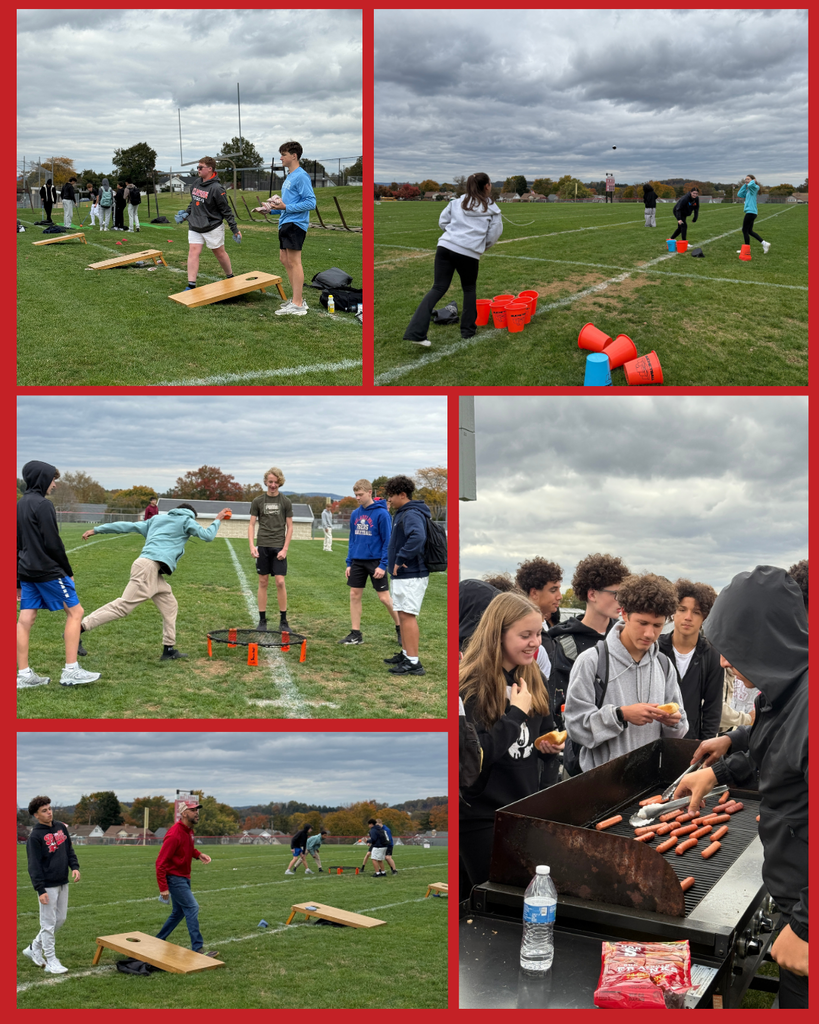 freshman playing lawn games and making hot dogs