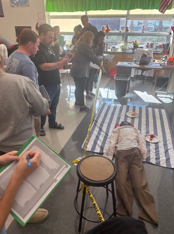 teachers looking at crime scene