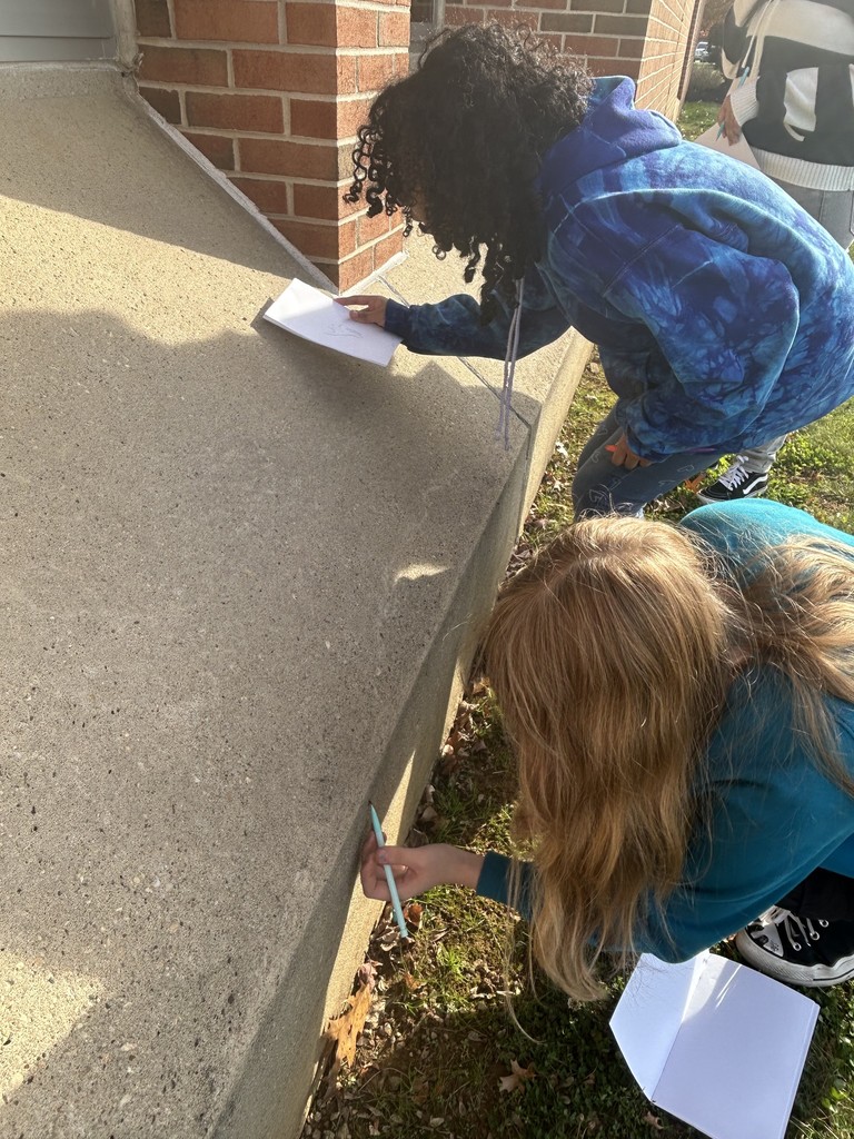 students writing in journals
