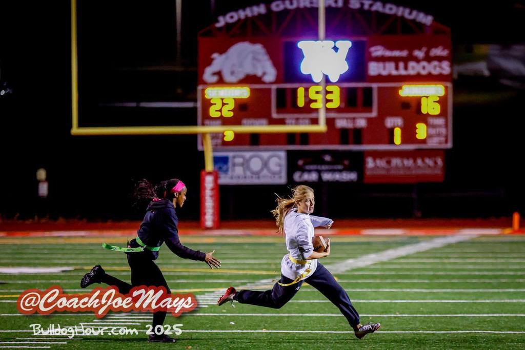 students running with ball