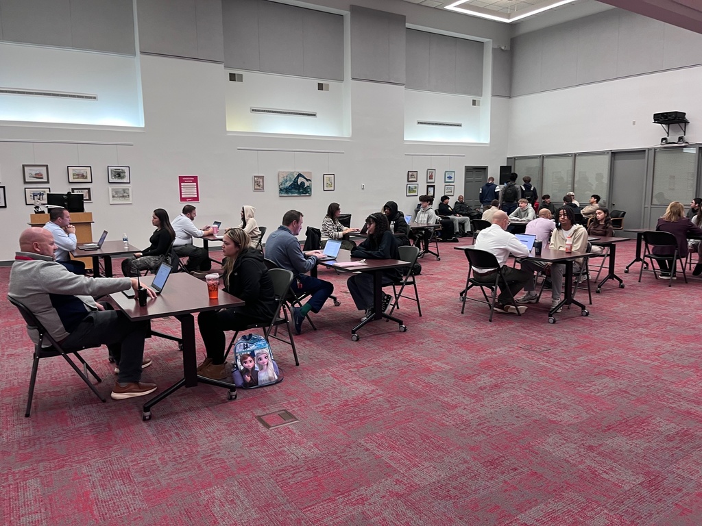 students talking with administrators