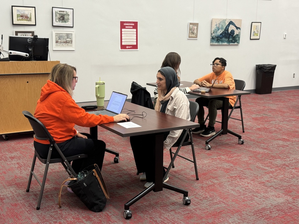 teachers talking with students 