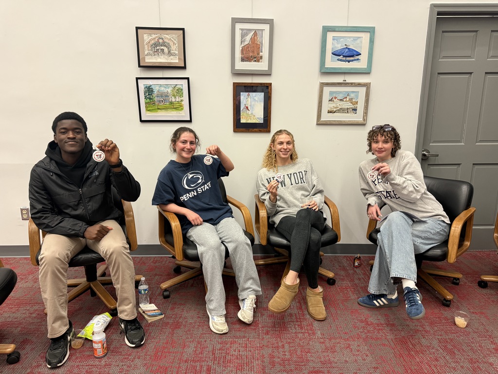 students holding key chains