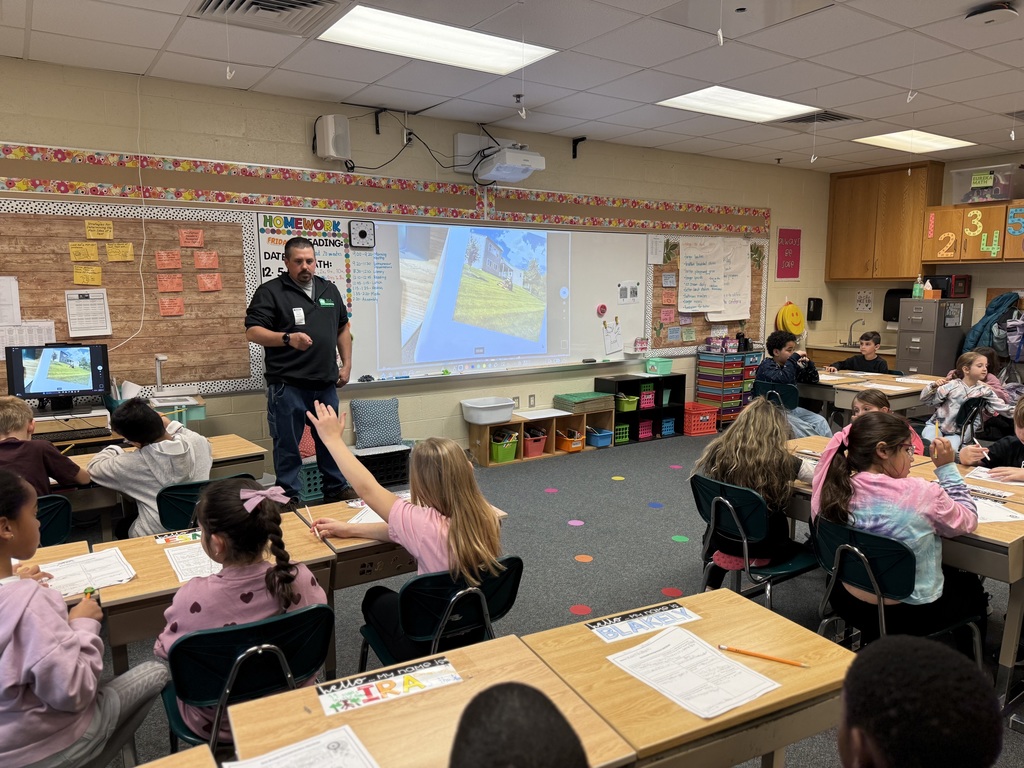 student raising hand to ask question to Entrepreneur