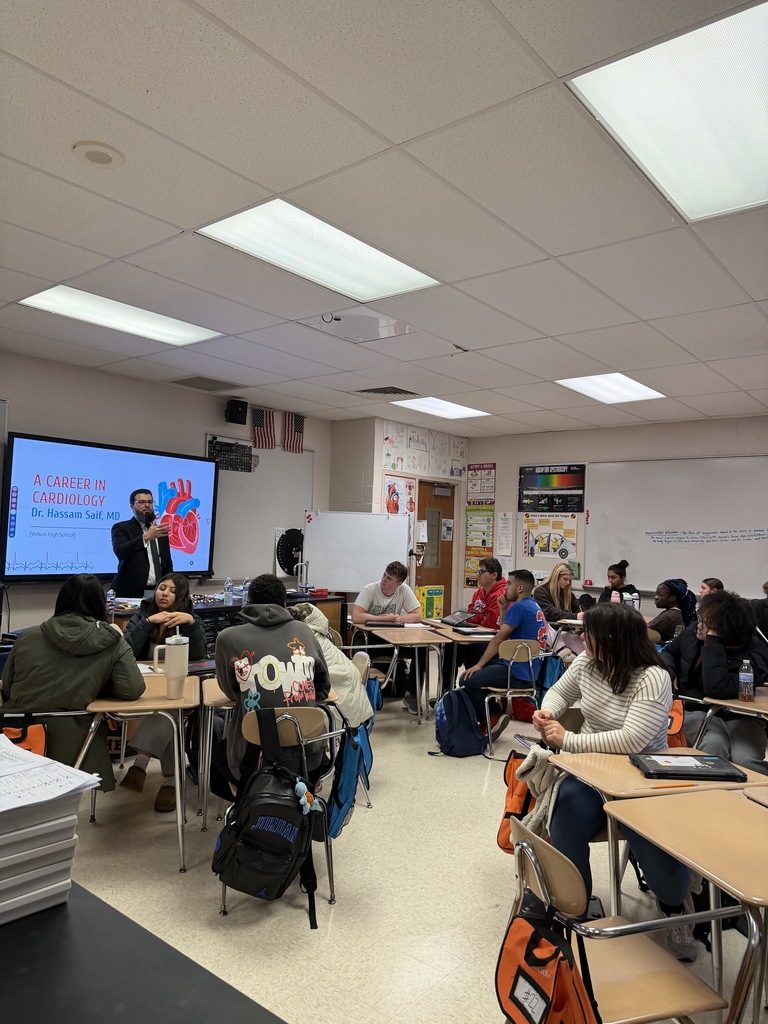 Dr. Saif talking to high school class