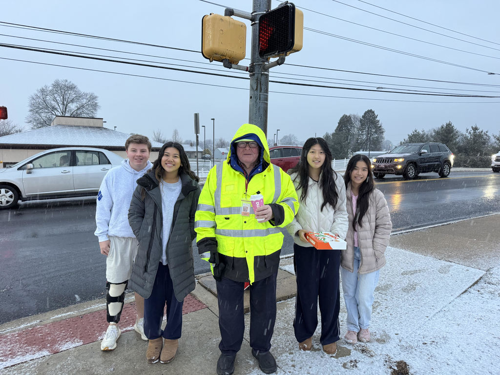students with crossing guard
