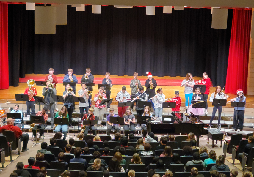 students performing with instruments
