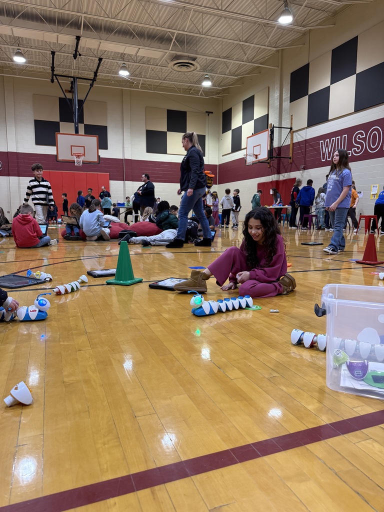 student using coding robot
