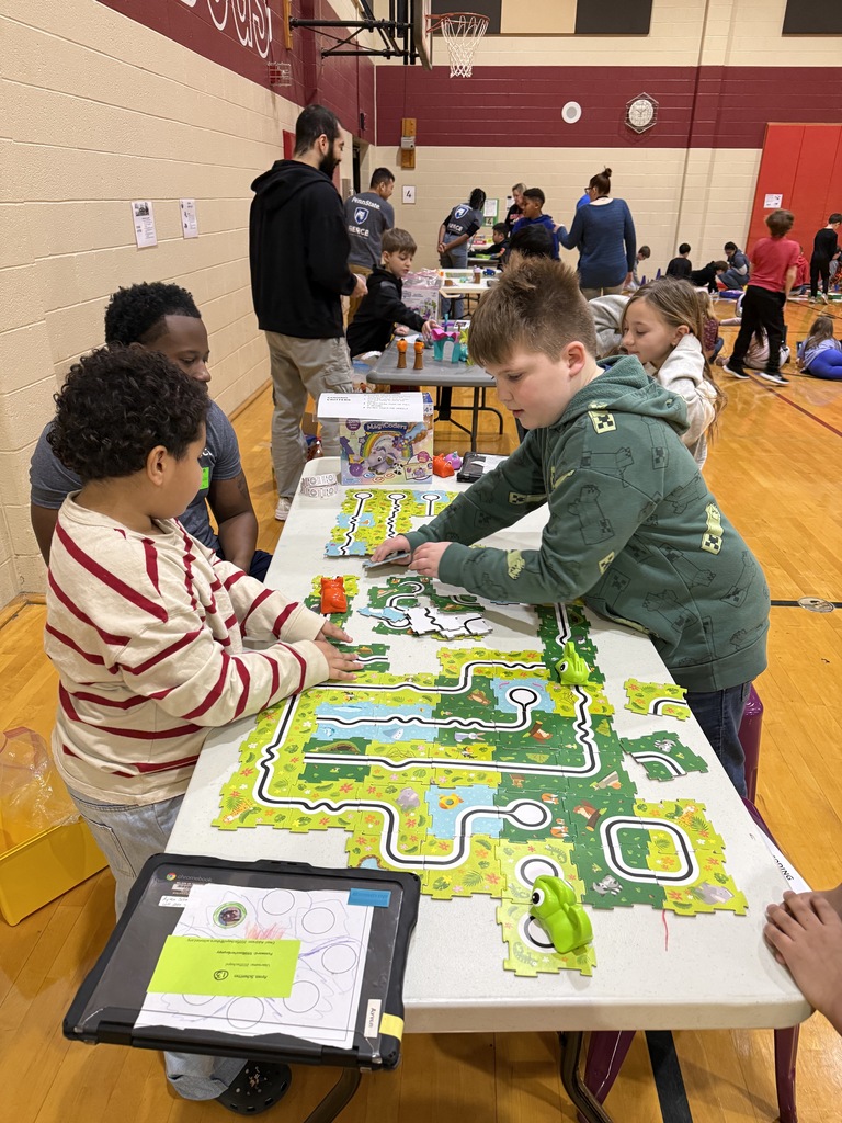 student working on maze coding