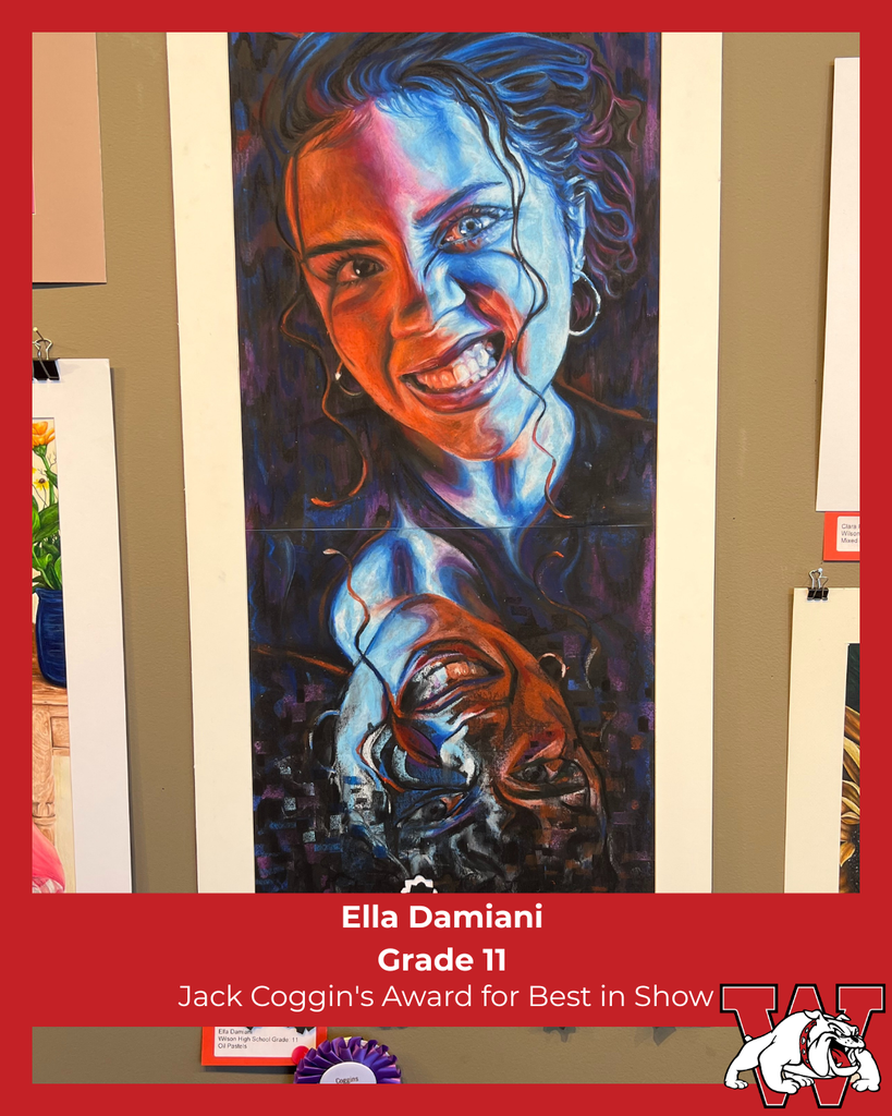 Colorful expressive portrait painting of a smiling young woman, split into warm red/orange tones on one side and cool blue tones on the other, with an upside-down mirrored version of the face below. The artwork is displayed with a red label reading “Ella Damiani, Grade 11, Jack Coggin’s Award for Best in Show,” and includes the Wilson bulldog logo.