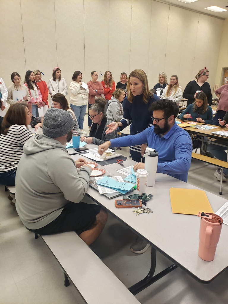 teachers working together at lunch tables