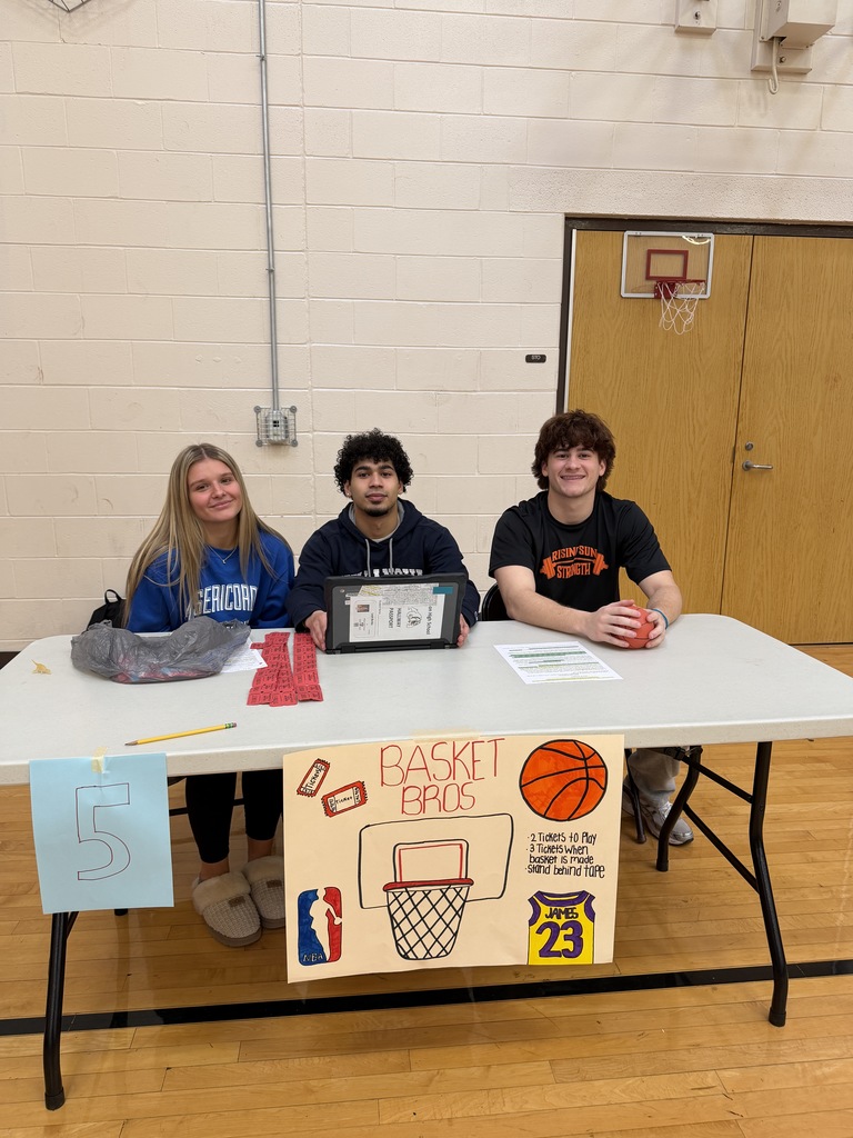 basket bros table with three students