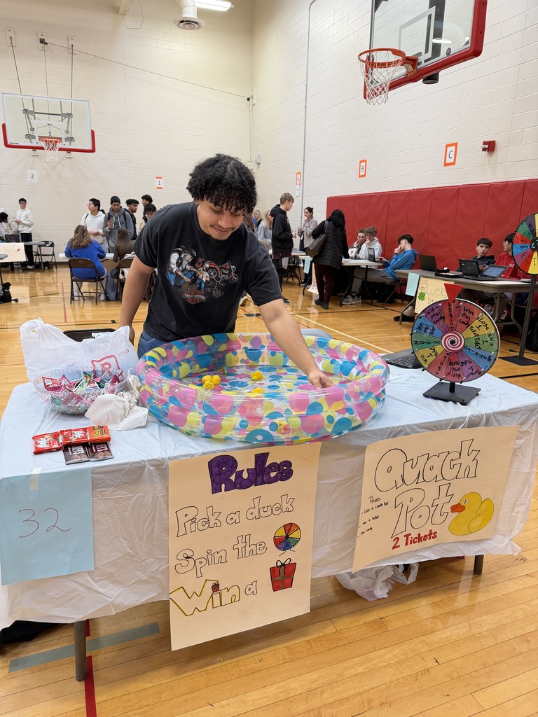 students picking our rubber ducky at table