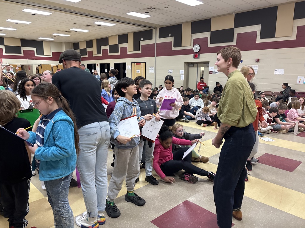 student talking to speakers