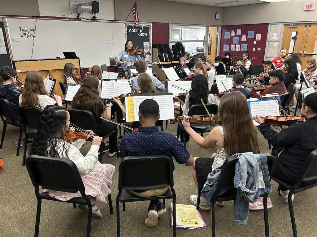 violin students practicing